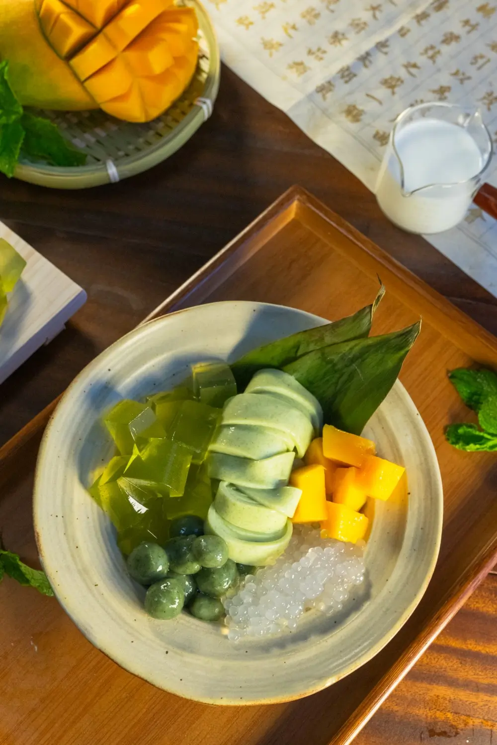 River noodles mixed with pandan flavor and other ingredients, colorful and appetizing at Sweet Newbie,a Dessert Shop in Chicago
