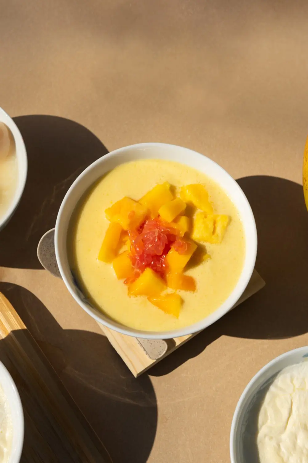 A classic dessert with mango, pomelo, and sago, sweet and refreshing at Sweet Newbie,a Dessert Shop in Chicago