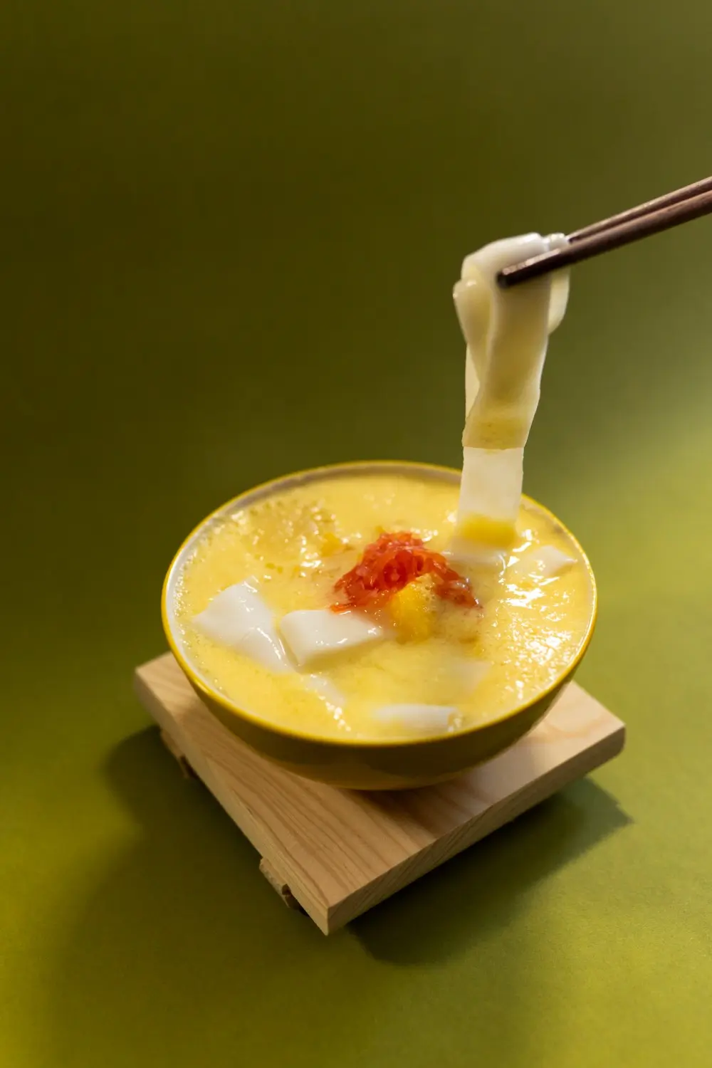 Small river noodles with mango pomelo sago, a creative dessert at Sweet Newbie,a Dessert Shop in Chicago