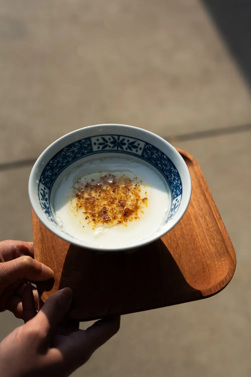 A drink with osmanthus and rice wine, icy and fragrant at Sweet Newbie,a Dessert Shop in Chicago