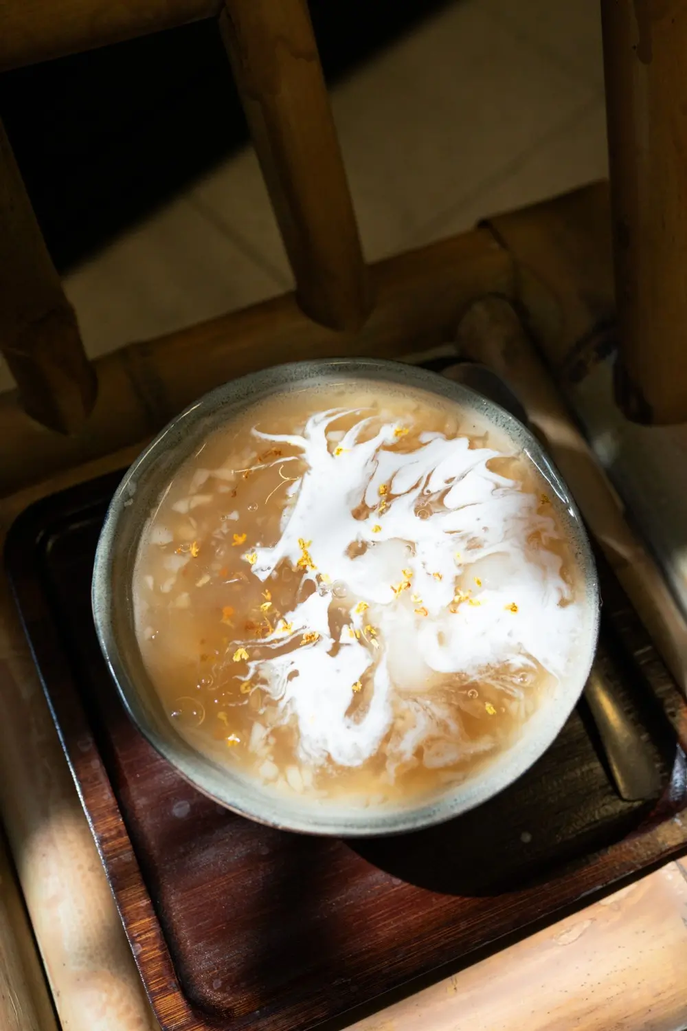 A drink with coconut, longan, and water chestnut, refreshing and sweet at Sweet Newbie,a Dessert Shop in Chicago