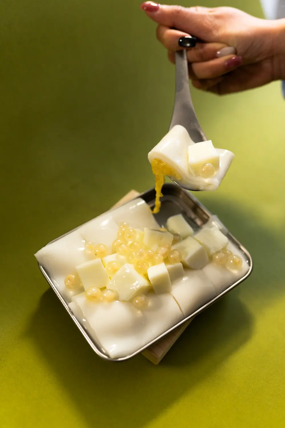 Rice noodle roll filled with durian, rich in durian flavor at Sweet Newbie,a Dessert Shop in Chicago