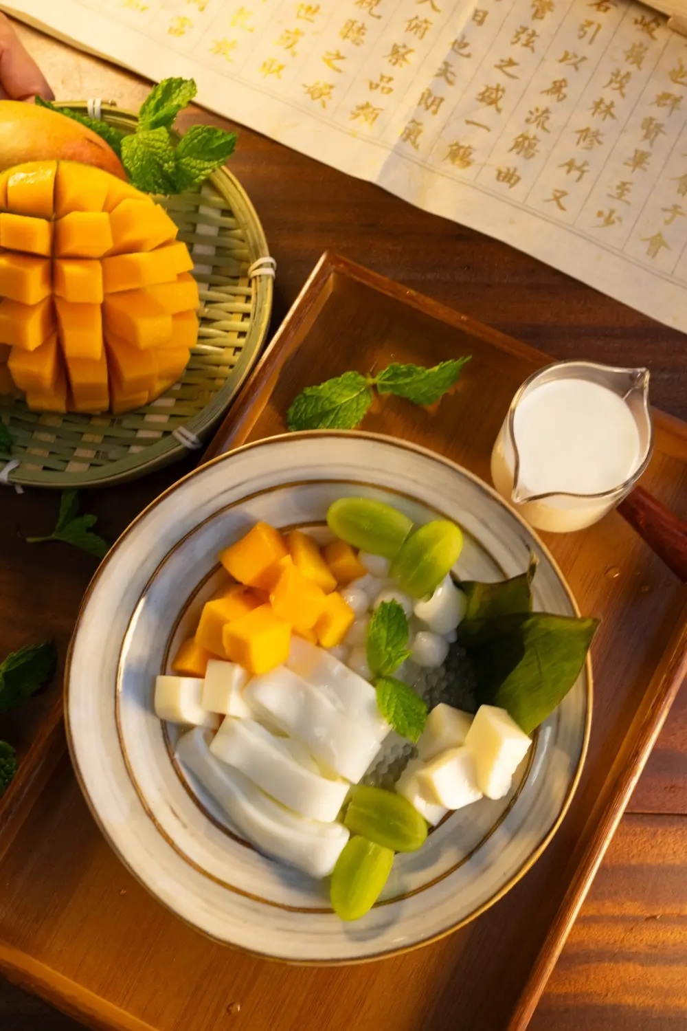 River noodles mixed with fresh mango, a tropical - flavored dish at Sweet Newbie,a Dessert Shop in Chicago